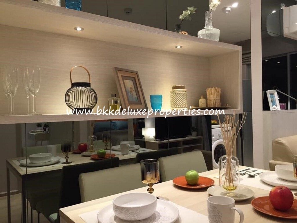 Contemporary condo for sale in Punnawithi. Shelves.