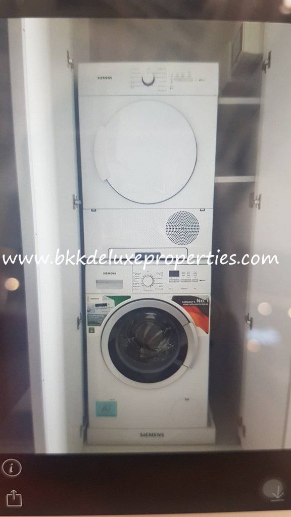 Bkkdeluxe Bangkok condo for rent in Ekkamai 12. Washing Machine.